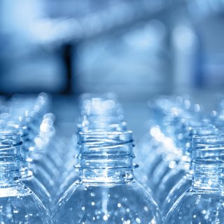 Banner image showing plastic bottles representing sustainable chemistry and circular economy